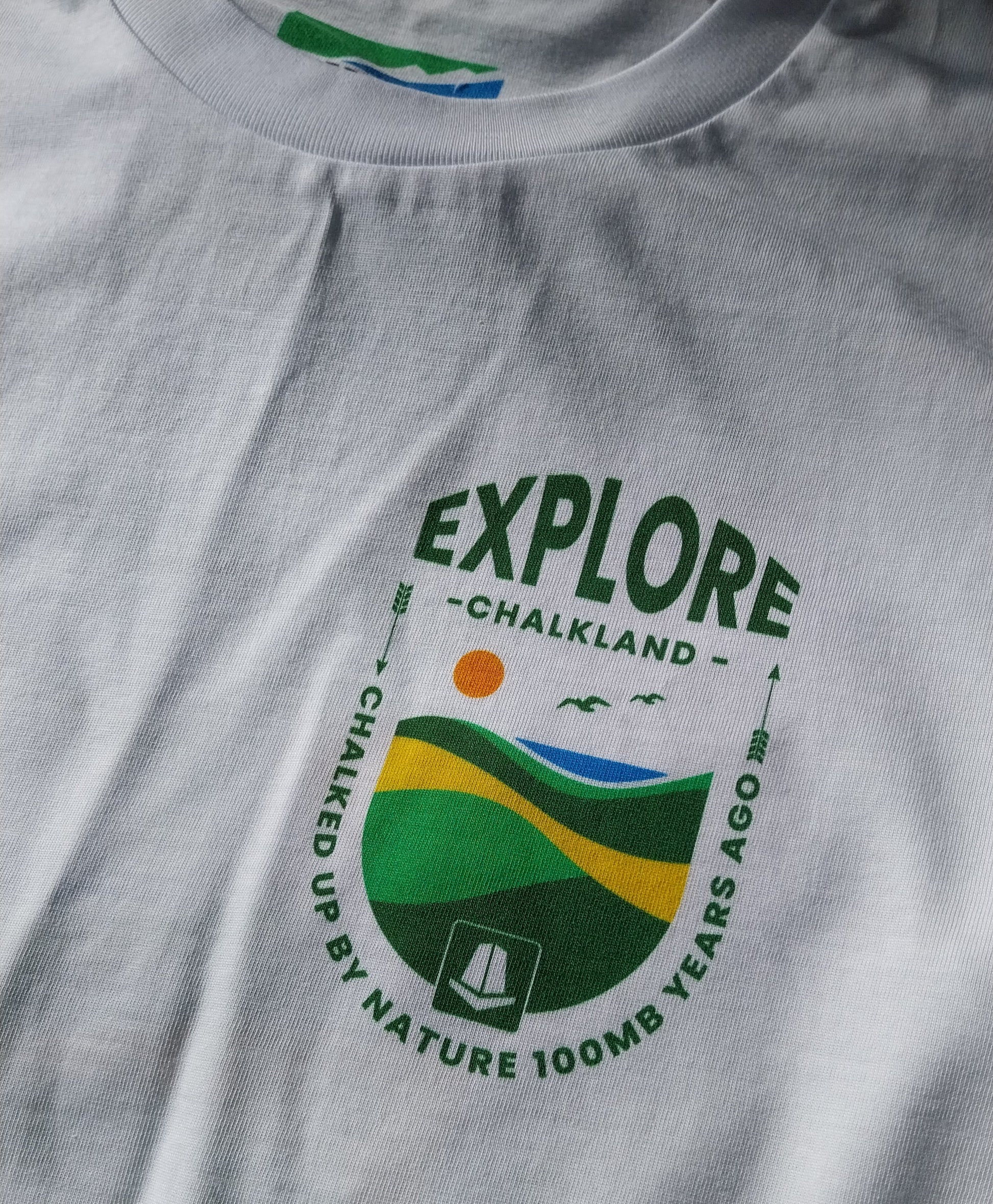 White t-shirt with a logo and text 